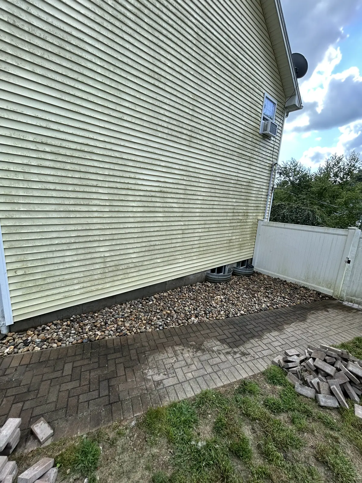 River rock along the side of the house
