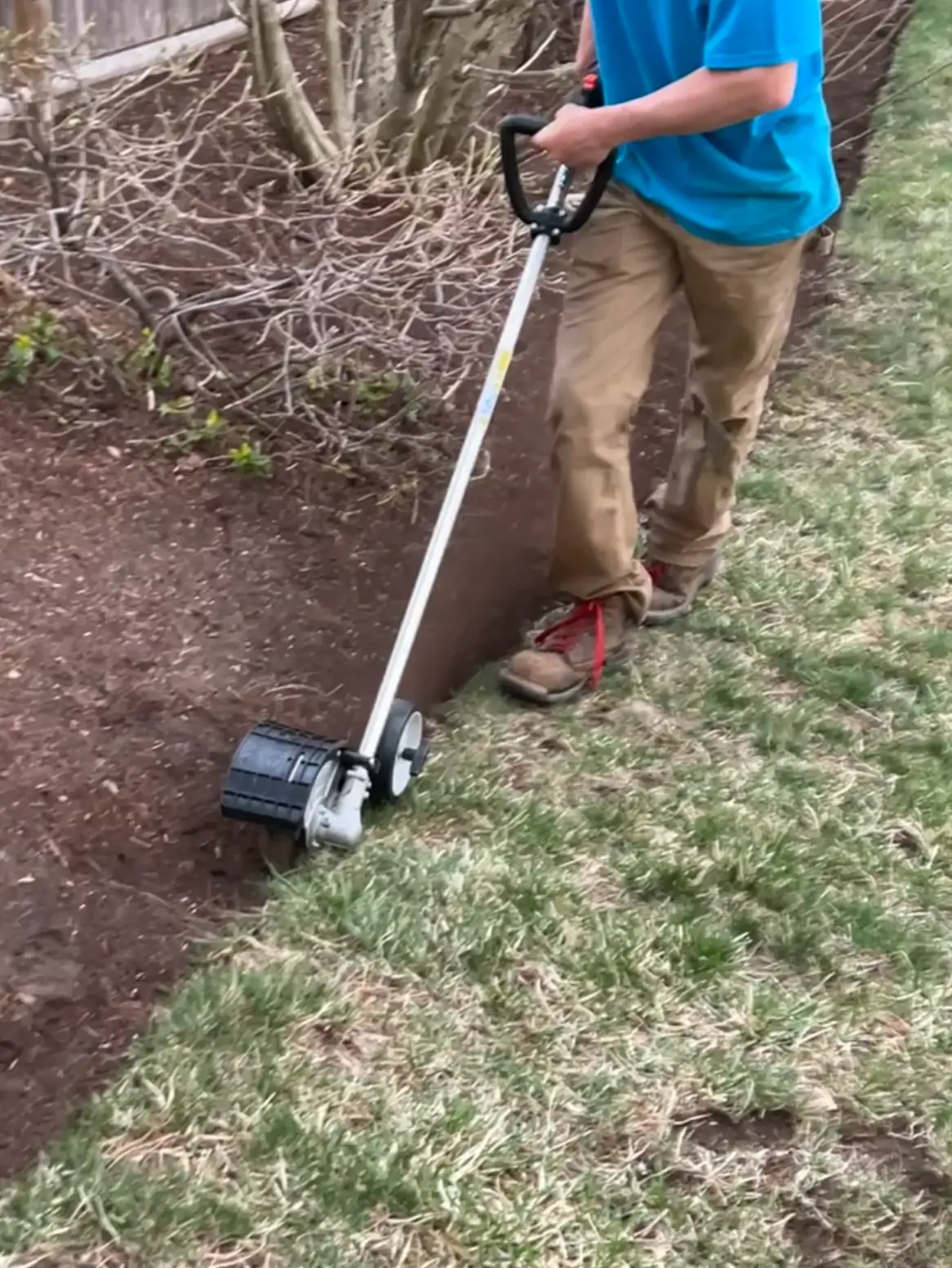 Cutting a fresh edge along the bed